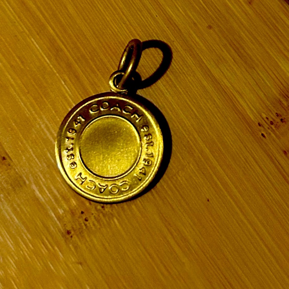Coach charm, brushed gold